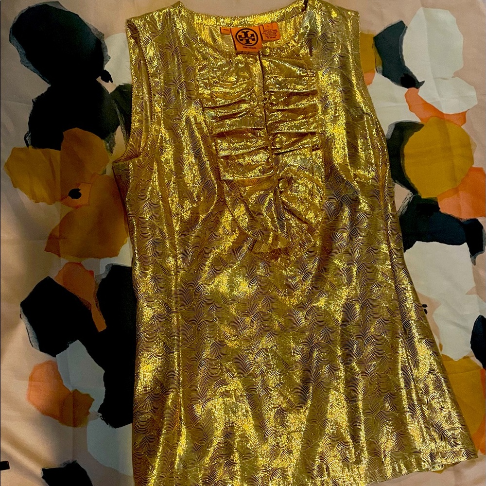Tory Burch gold sleeveless top with side zipper.
